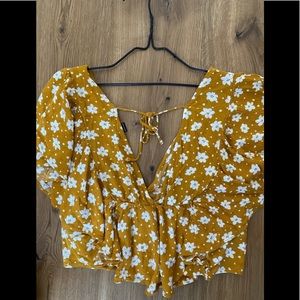 Yellow and white floral blouse